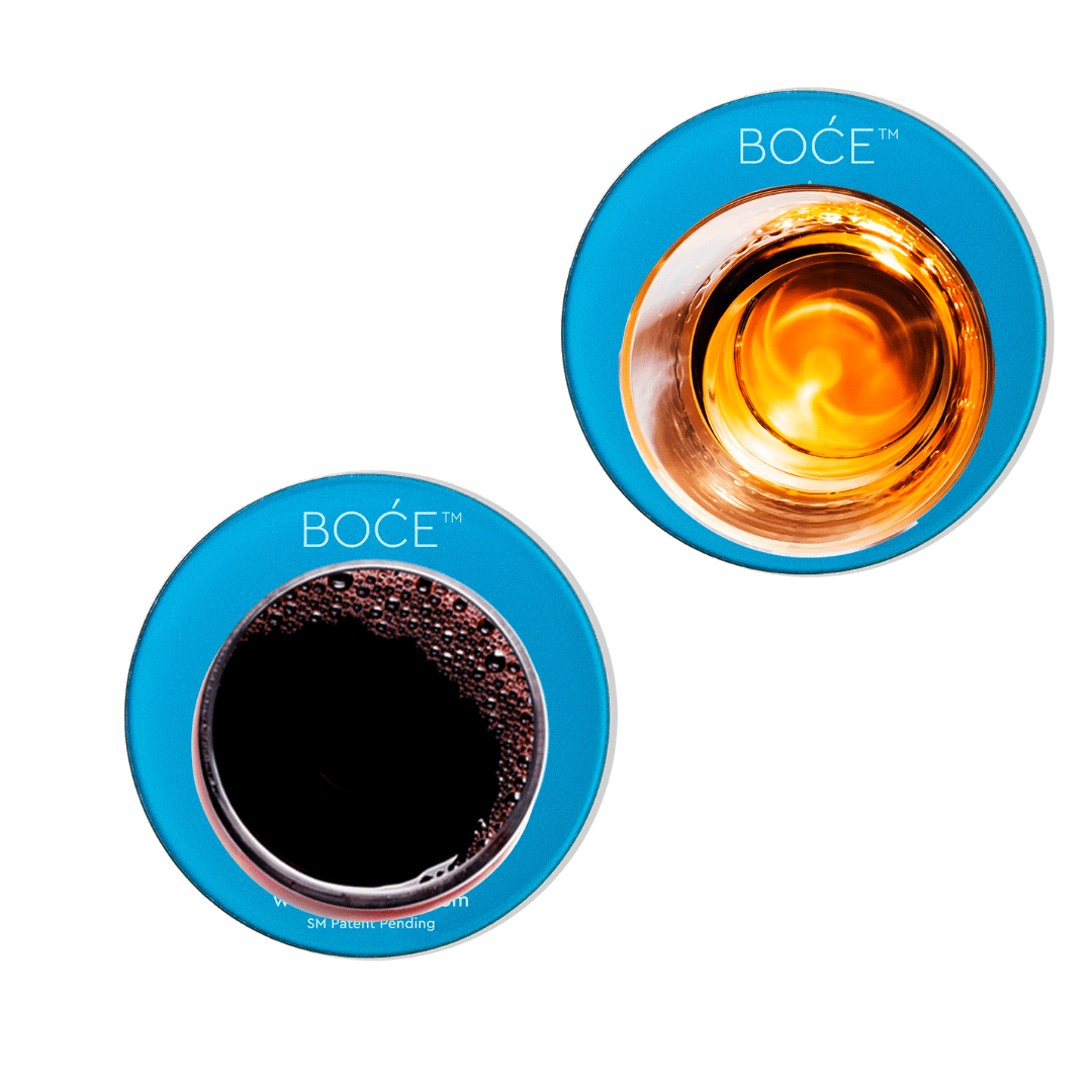 Two blue coasters with circular designs of a glass of wine and a glass of whiskey, branded BOCE.